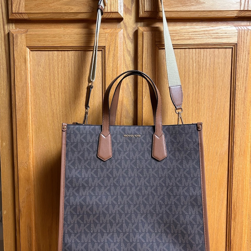 2 items. Michael Kors Dark Brown and Tan Signature Tote & wristlet wallet